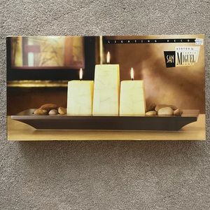 Table decor with 3 candles and rock base